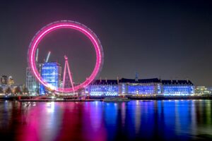 Stunning long exposure of the illuminated London Eye over the River Thames.