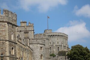 A stunning view of Windsor Castle's historic architecture against a clear blue sky.