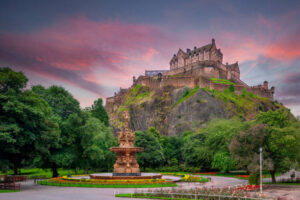 Beautiful photo of Edinburgh castle with red sky