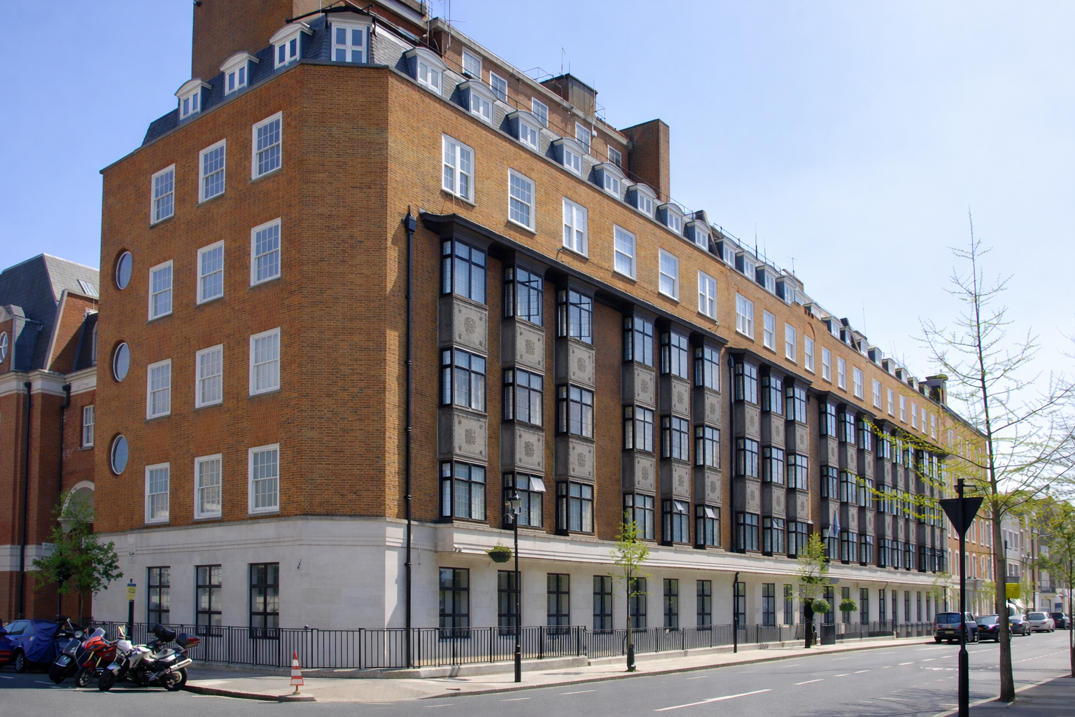 Exterior of King Edward VII’s Hospital in London on a quiet street.