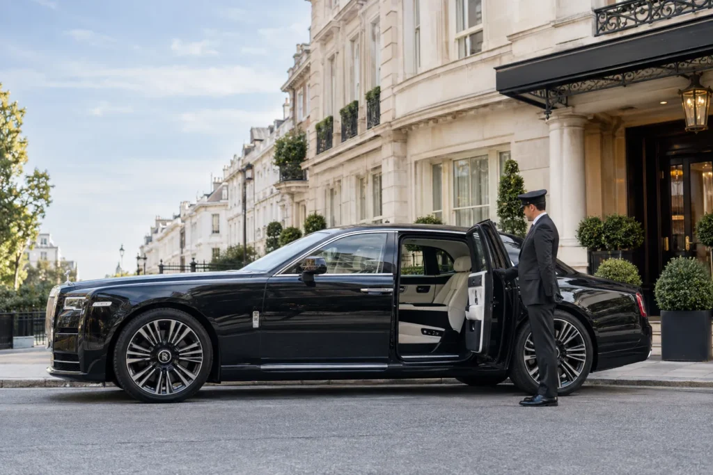 2027 rolls royce chauffeur outside luxury London hotel