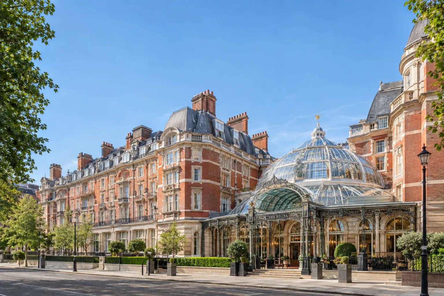 Exterior view of The Landmark hotel in London featuring Victorian architecture and glass dome